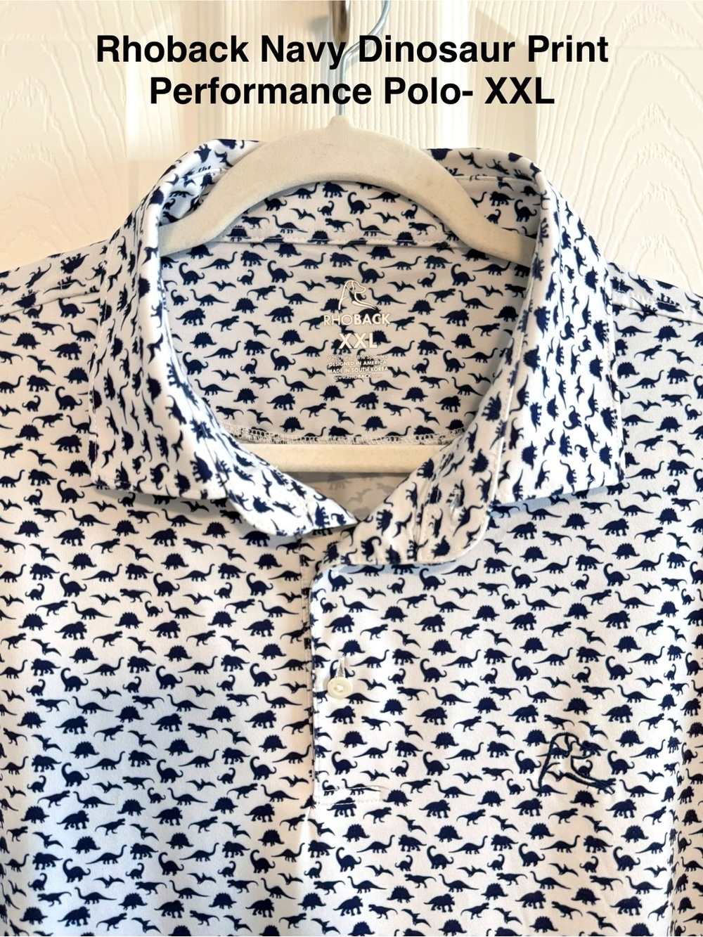 Rhoback Performance Polo- White with Navy Dinosaur Print